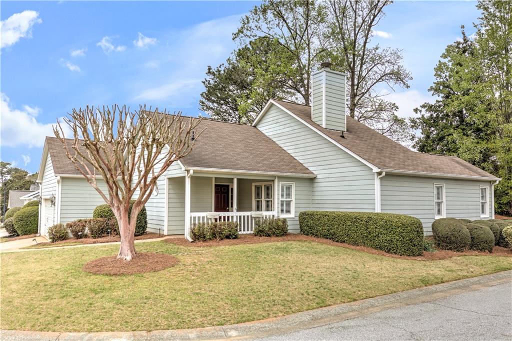 94 Robyn Way Marietta, GA 30062 - Photo 2 of 40 a view of a house with a yard