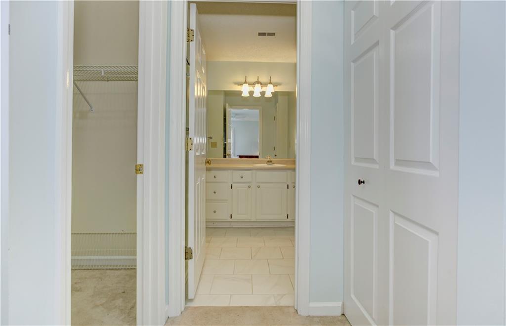 94 Robyn Way Marietta, GA 30062 - Photo 32 of 40 view of a bathroom with a glass door shower