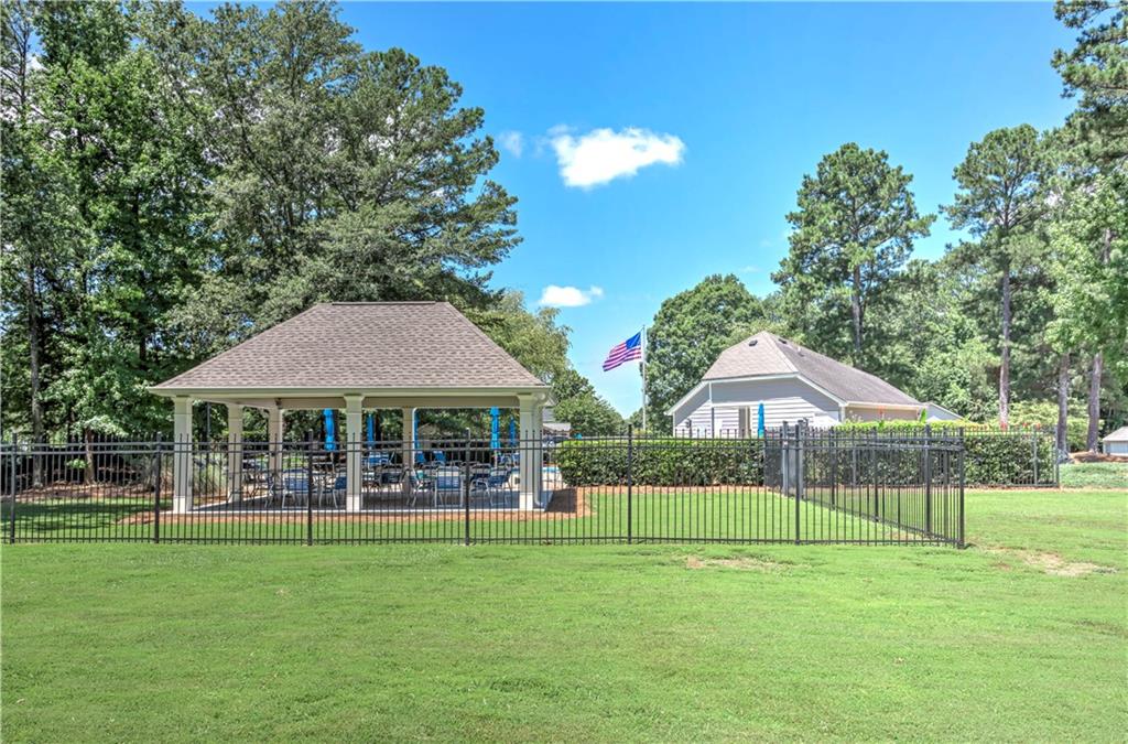 94 Robyn Way Marietta, GA 30062 - Photo 40 of 40 a house view with a garden space