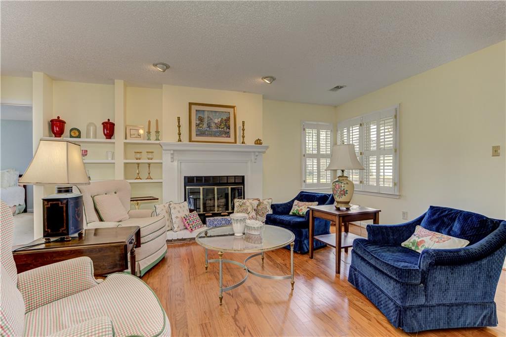 94 Robyn Way Marietta, GA 30062 - Photo 8 of 40 a living room with furniture and a fireplace
