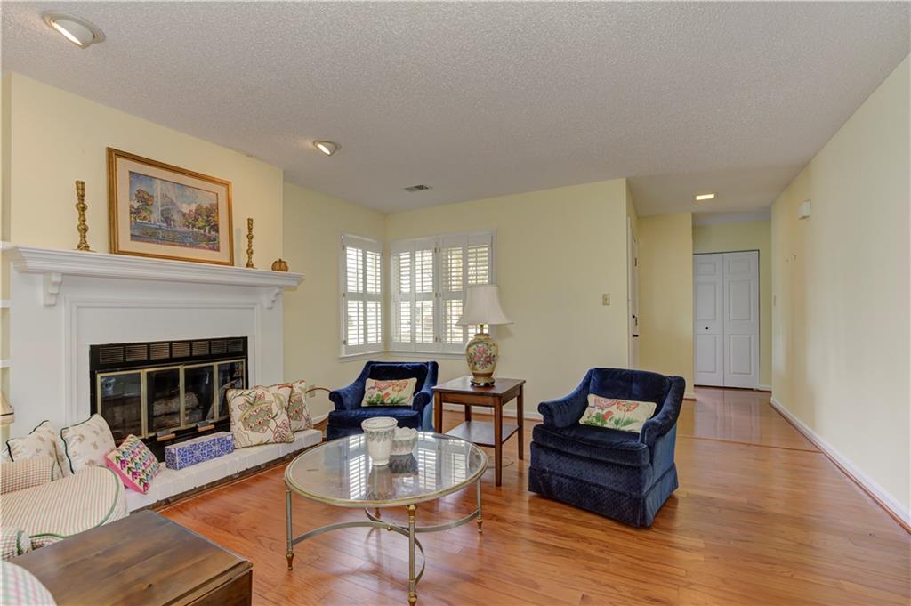 94 Robyn Way Marietta, GA 30062 - Photo 9 of 40 a living room with furniture fireplace and window