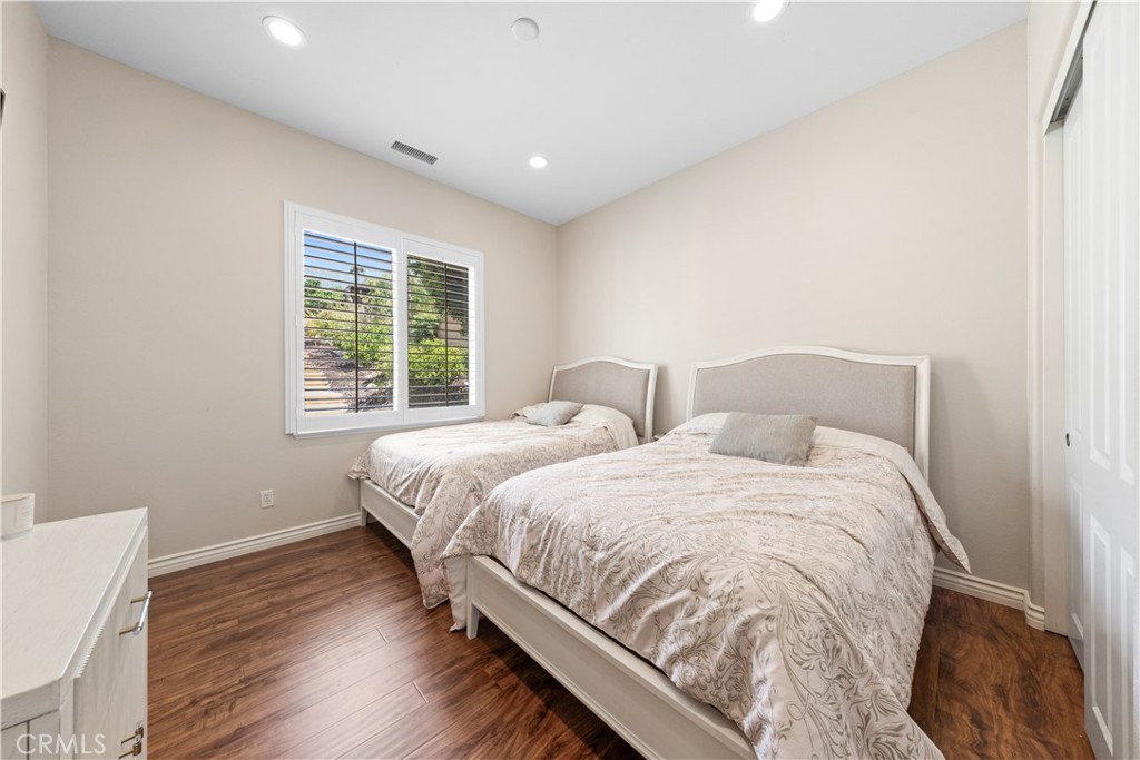 10140 Jacaranda Court Rancho Cucamonga, CA 91737 - Photo 24 of 70 Downstairs guest bedroom