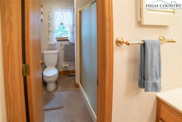 a bathroom with a sink and toilet