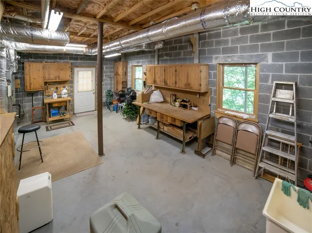a room with furniture and a window