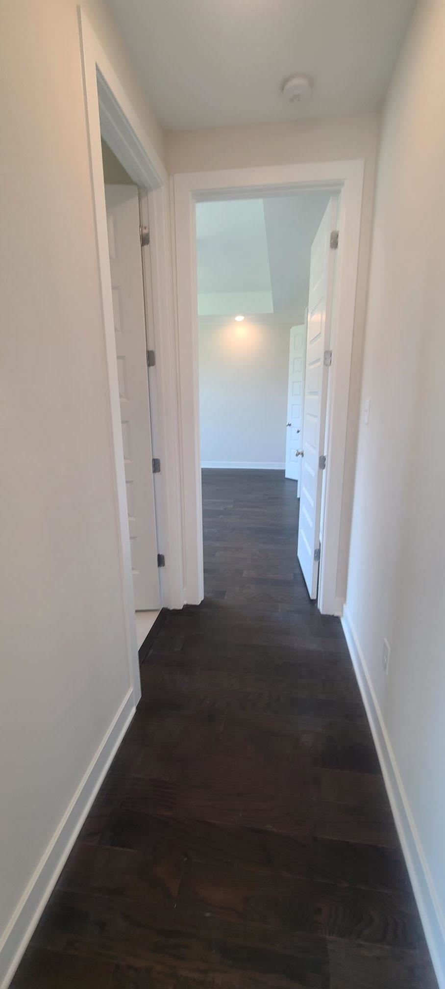 501 Halle Park Drive Collierville, TN 38017 - Photo 15 of 37 an empty room with wooden floor