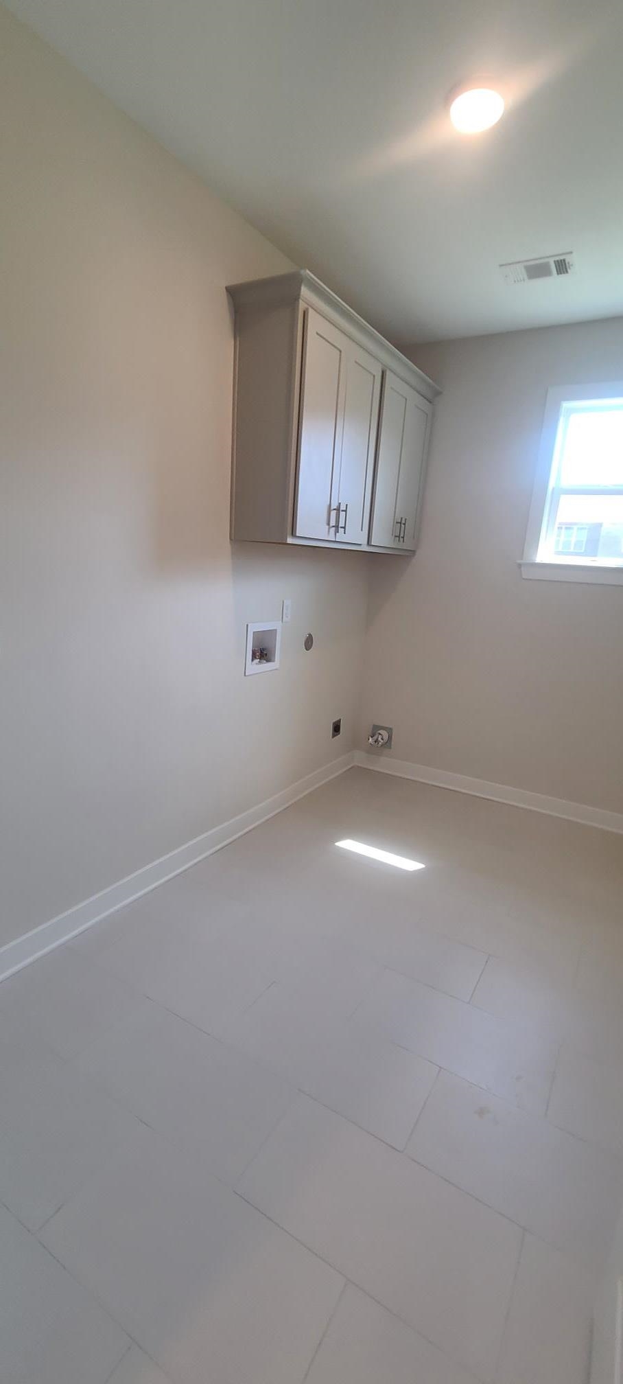 501 Halle Park Drive Collierville, TN 38017 - Photo 16 of 37 an empty room with a empty space and windows