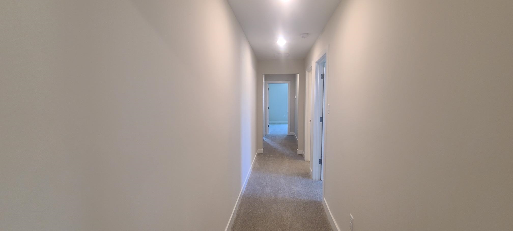 501 Halle Park Drive Collierville, TN 38017 - Photo 26 of 37 a view of a hallway with wooden floor