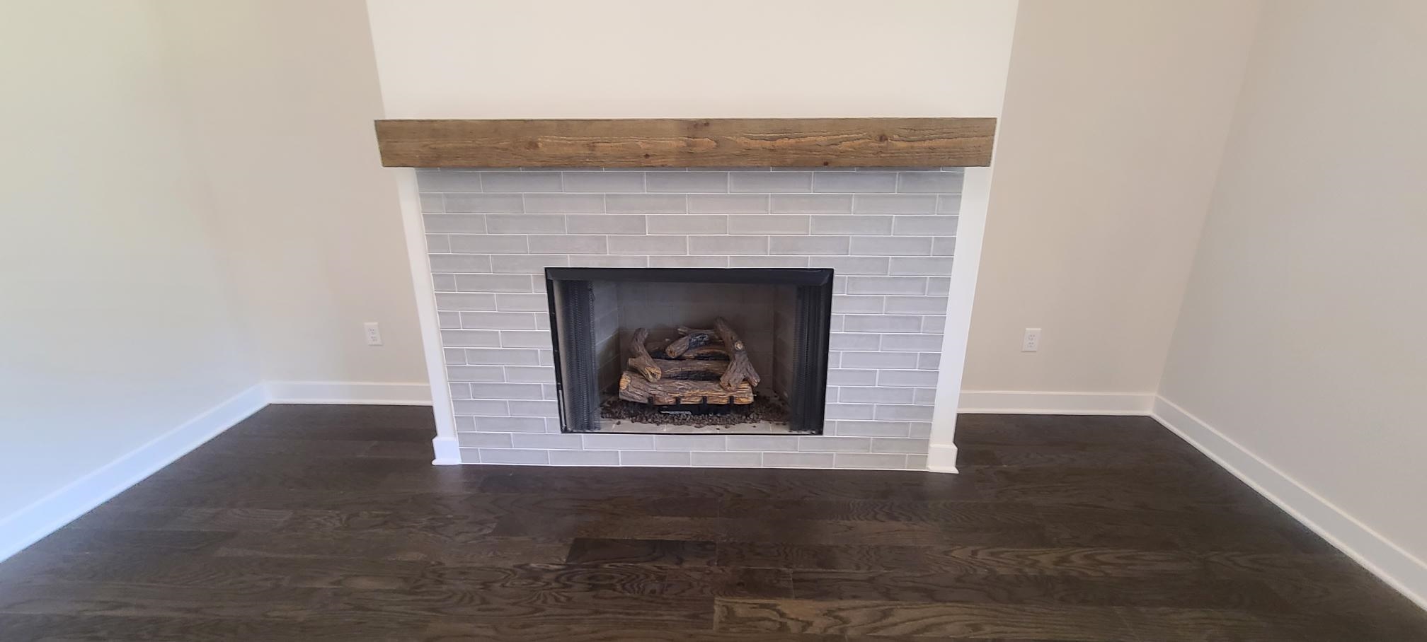 501 Halle Park Drive Collierville, TN 38017 - Photo 8 of 37 a living room with a fireplace