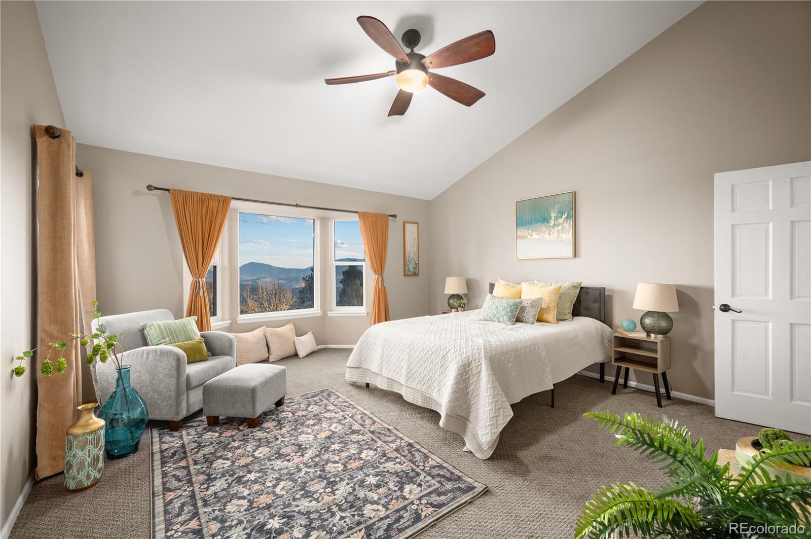 11740 Baca Road Conifer, CO 80433 - Photo 35 of 49 a bed room with a bed and a couch