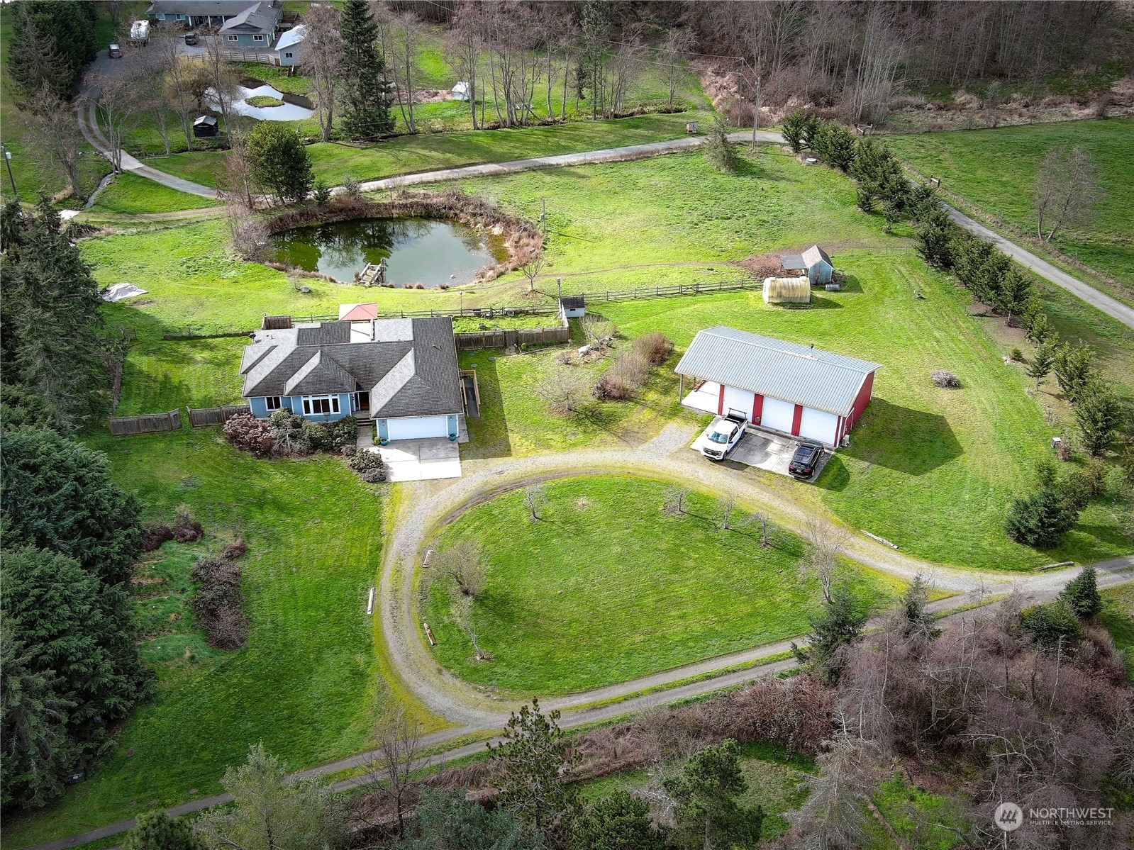 61 Camelot Road Sequim, WA 98382 - Photo 1 of 33 an aerial view of a house with outdoor space
