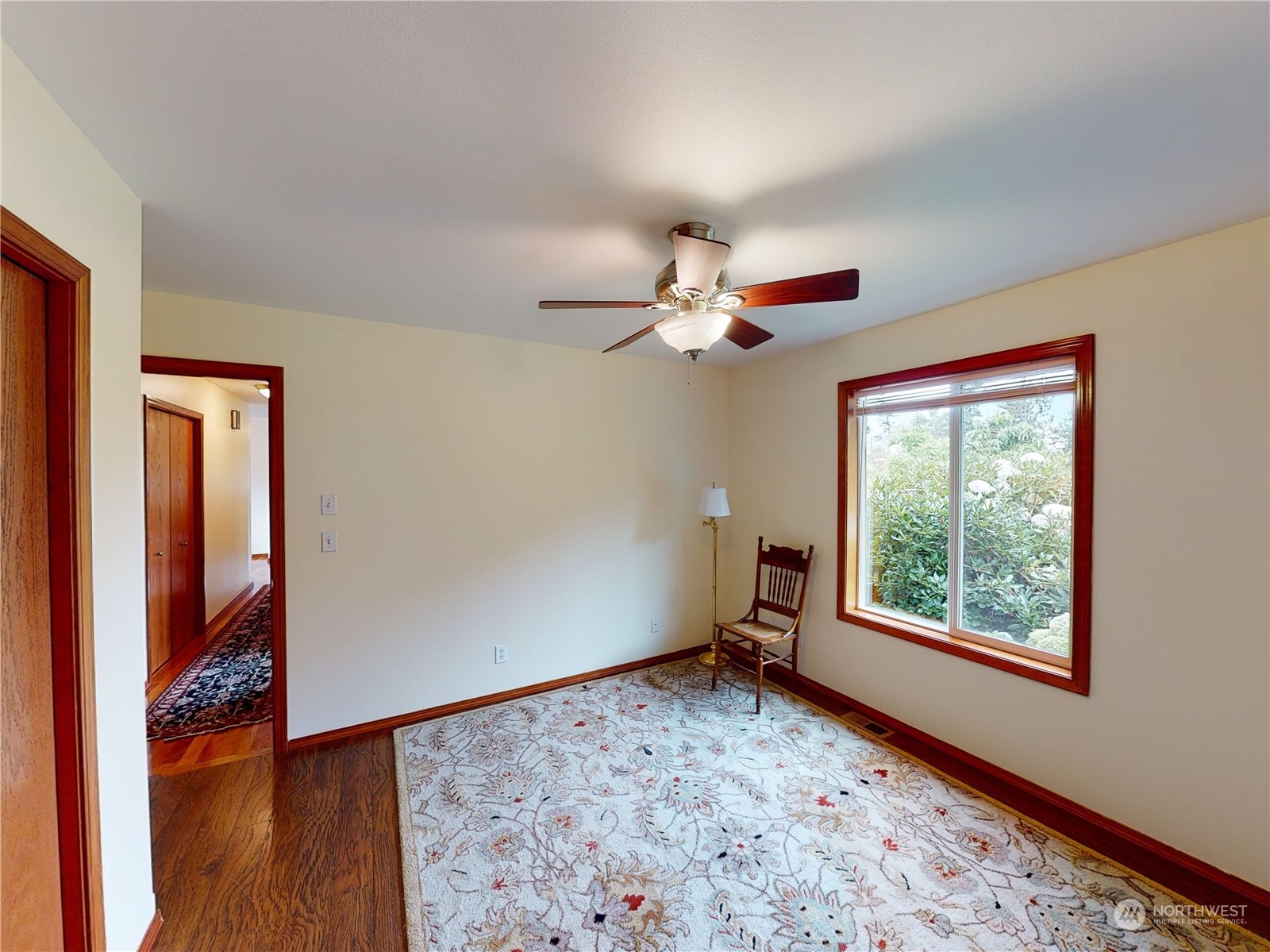 61 Camelot Road Sequim, WA 98382 - Photo 17 of 33 wooden floor in an empty room with a window