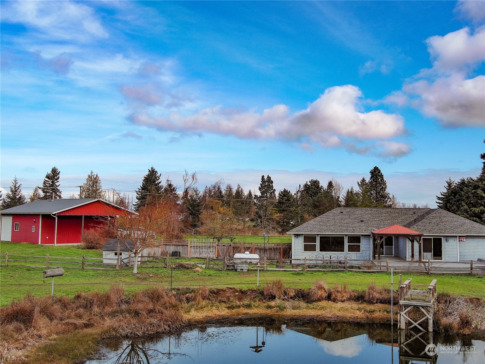 61 Camelot Road Sequim, WA 98382 - Photo 32 of 33 a front view of a house with garden