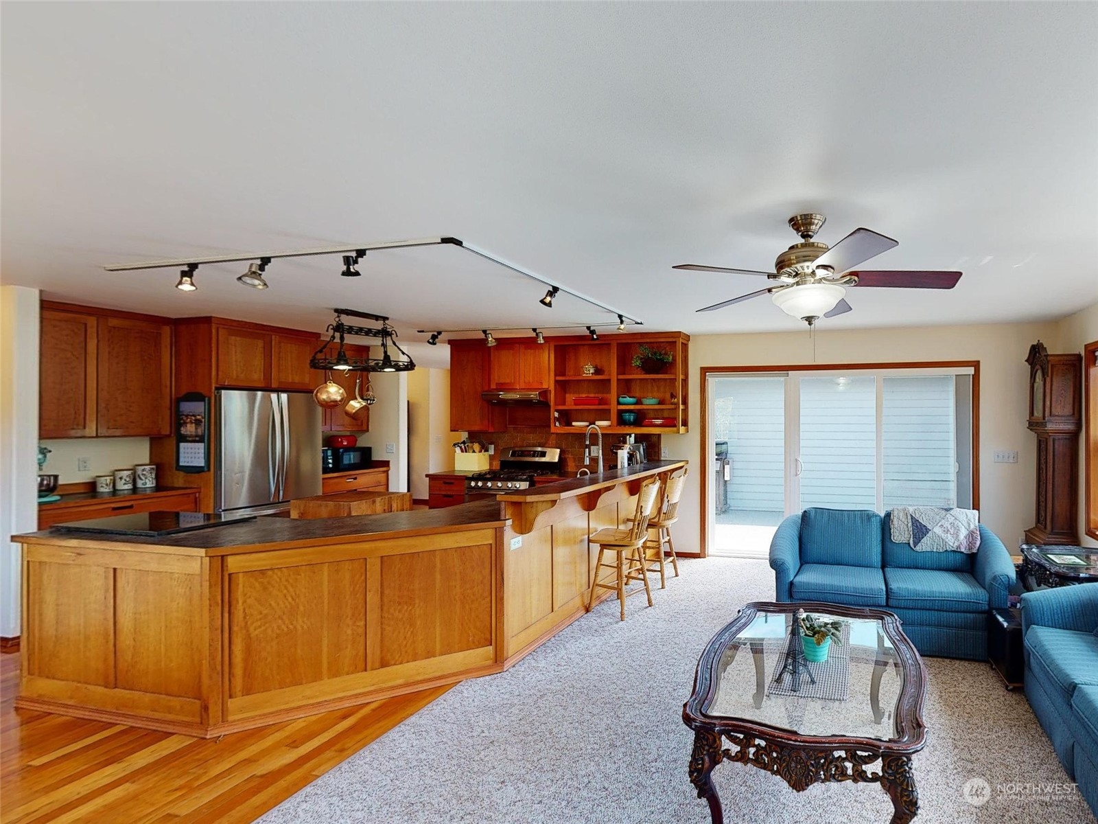 61 Camelot Road Sequim, WA 98382 - Photo 8 of 33 a living room with furniture kitchen view and a chandelier