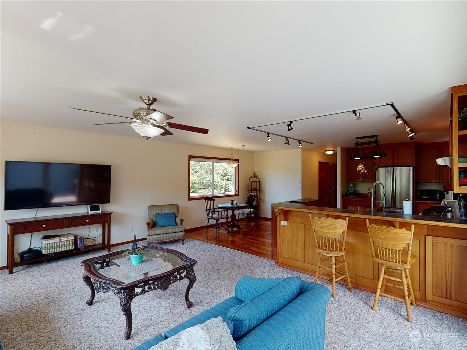 61 Camelot Road Sequim, WA 98382 - Photo 10 of 33 a living room with furniture and a flat screen tv