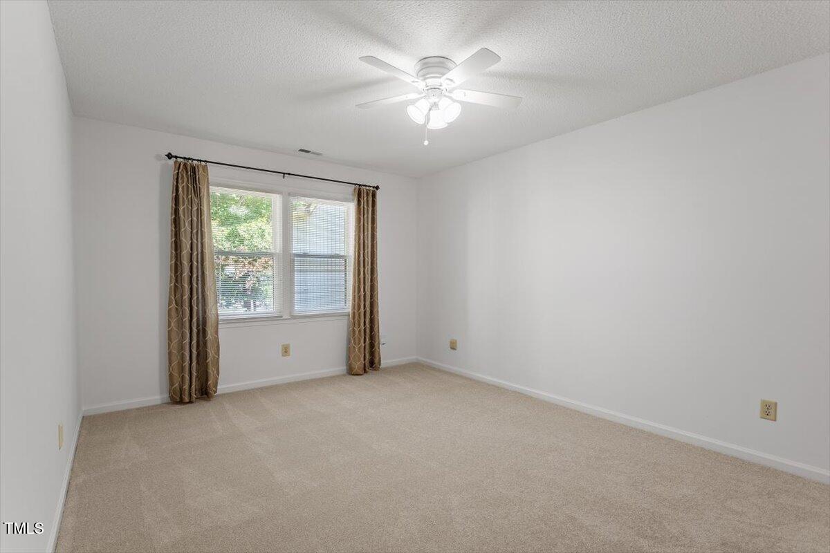 7911 Yester Court Raleigh, NC 27615 - Photo 21 of 33 Primary Bedroom