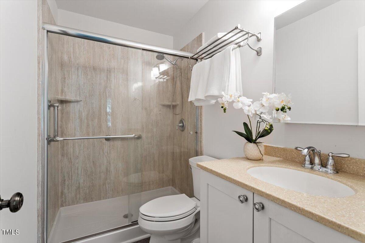 7911 Yester Court Raleigh, NC 27615 - Photo 24 of 33 Updated Primary Bath
