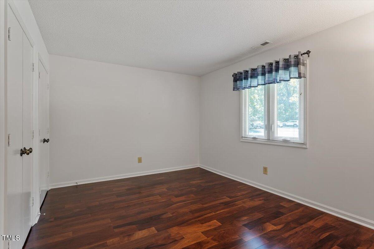 7911 Yester Court Raleigh, NC 27615 - Photo 25 of 33 Bedroom #2 has 2 Closets!