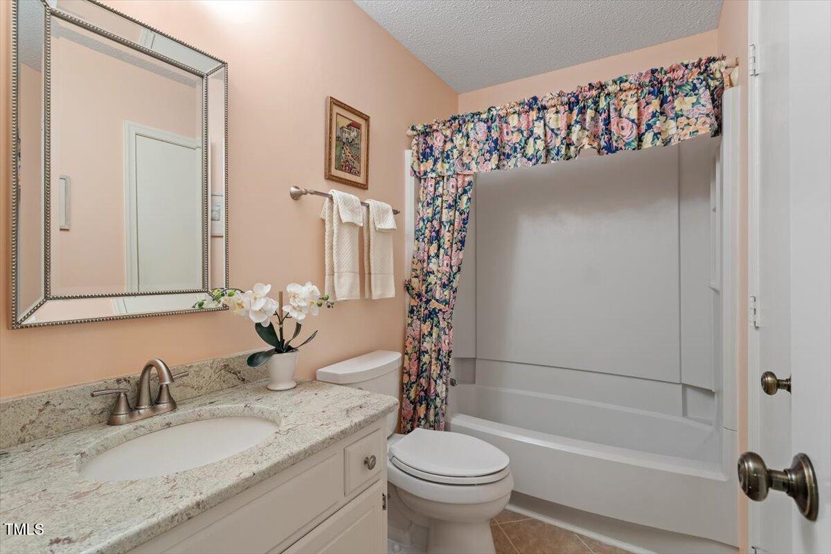 7911 Yester Court Raleigh, NC 27615 - Photo 28 of 33 Guest Bath