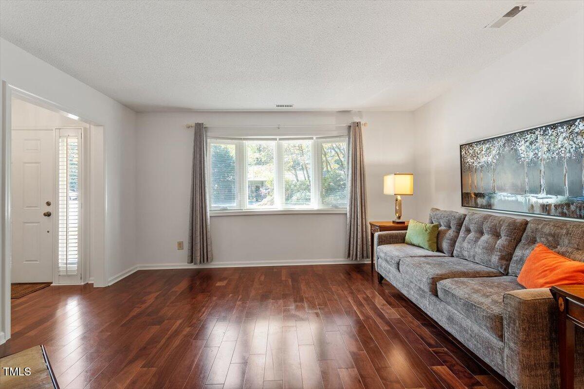 7911 Yester Court Raleigh, NC 27615 - Photo 5 of 33 Engineered Hardwood Floors