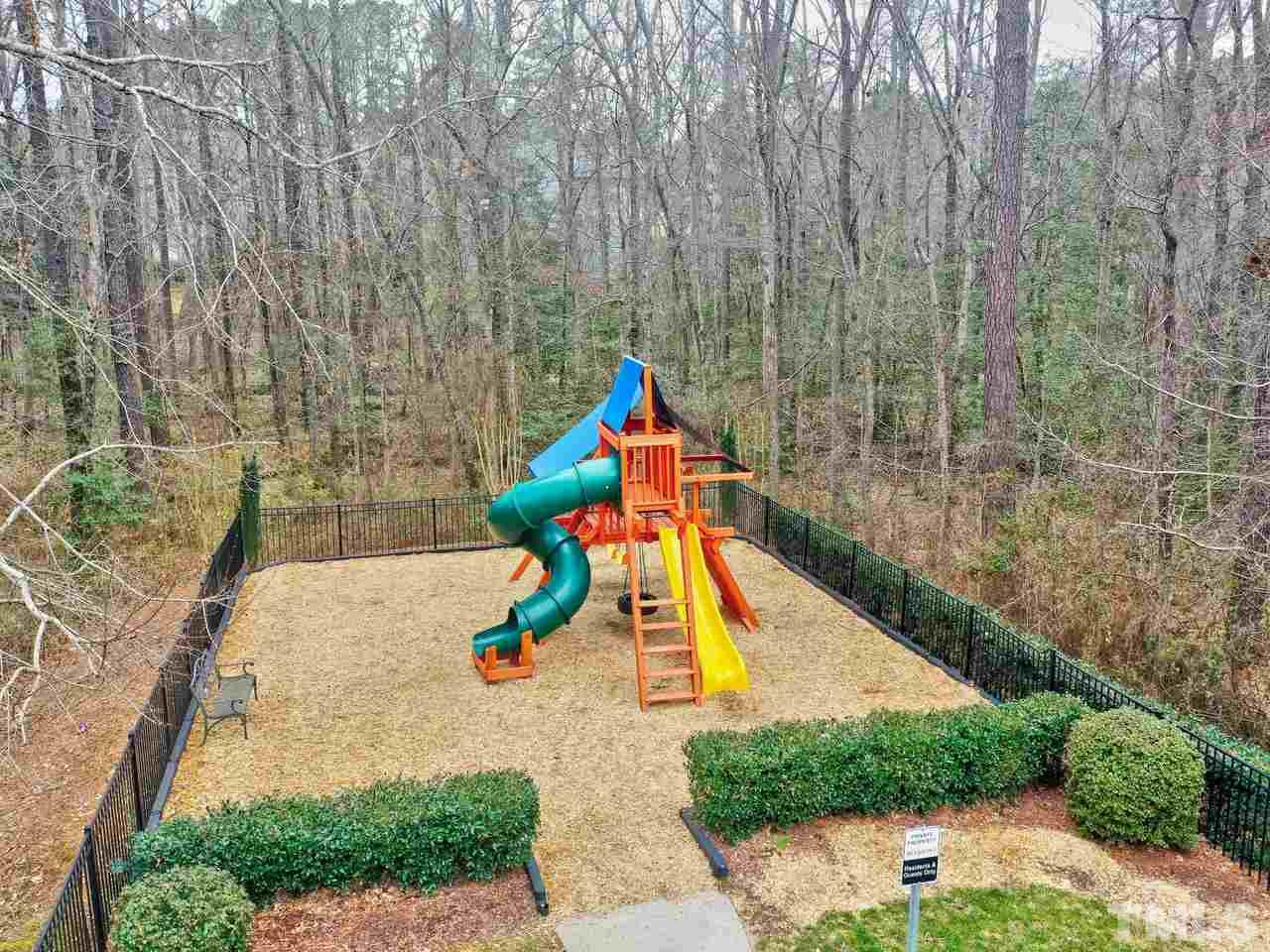 8325 Henderson Road Apex, NC 27539 - Photo 29 of 29 a view of outdoor space with swimming pool