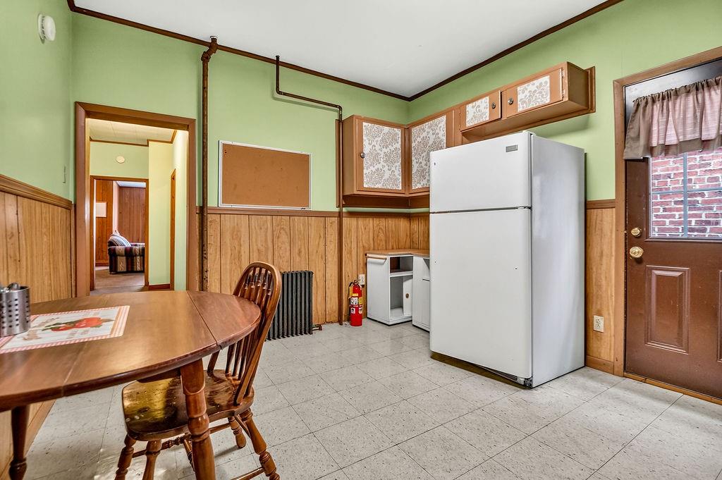 1023 Philadelphia Street Indiana, PA 15701 - Photo 13 of 40 a dining room with furniture and a refrigerator