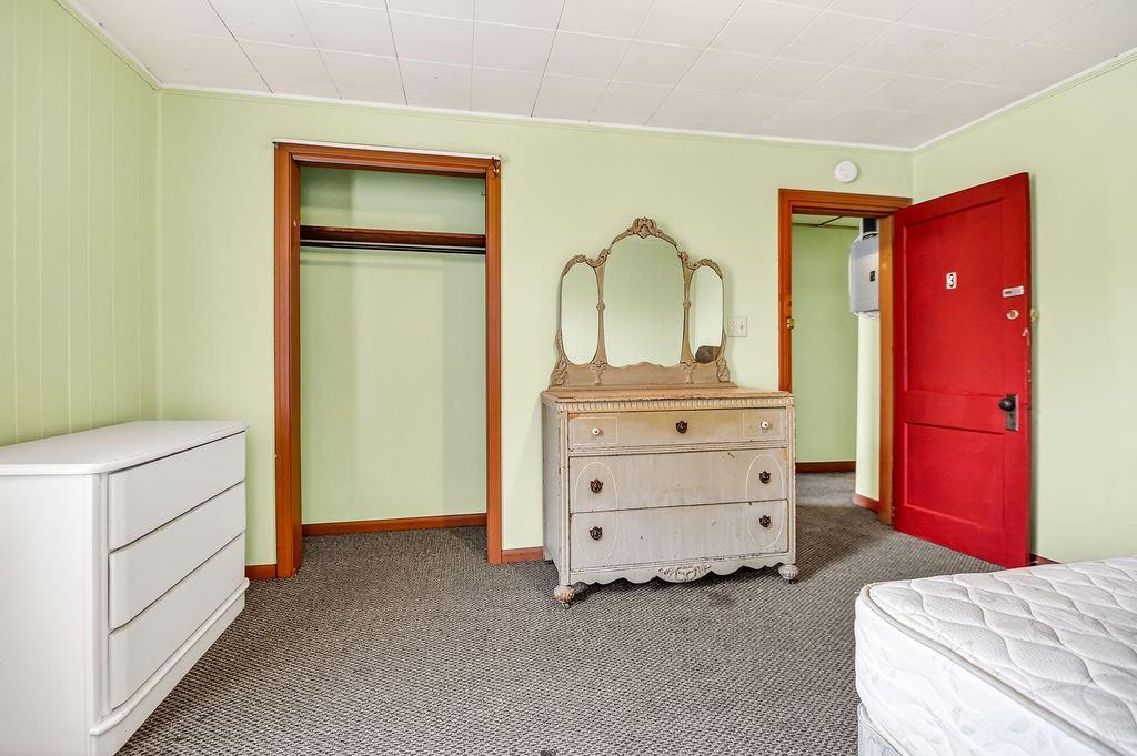 1023 Philadelphia Street Indiana, PA 15701 - Photo 22 of 40 a bedroom with a bed and a dresser