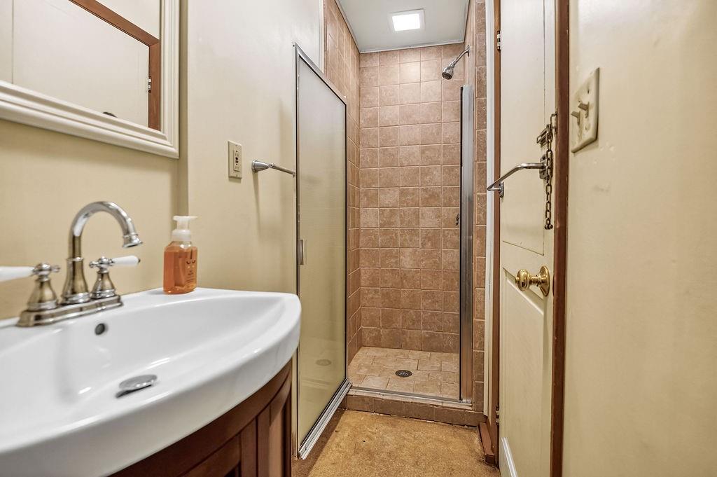 1023 Philadelphia Street Indiana, PA 15701 - Photo 28 of 40 a bathroom with a sink and a mirror