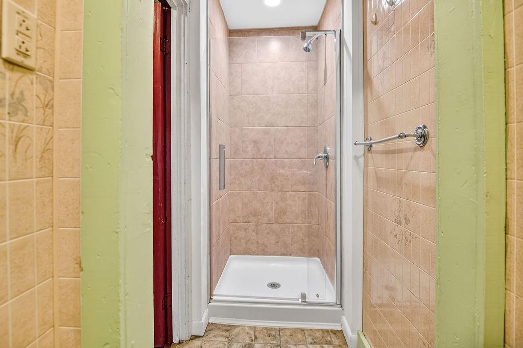 1023 Philadelphia Street Indiana, PA 15701 - Photo 39 of 40 a bathroom with a glass shower door