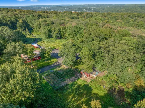a view of a field with an outdoor space