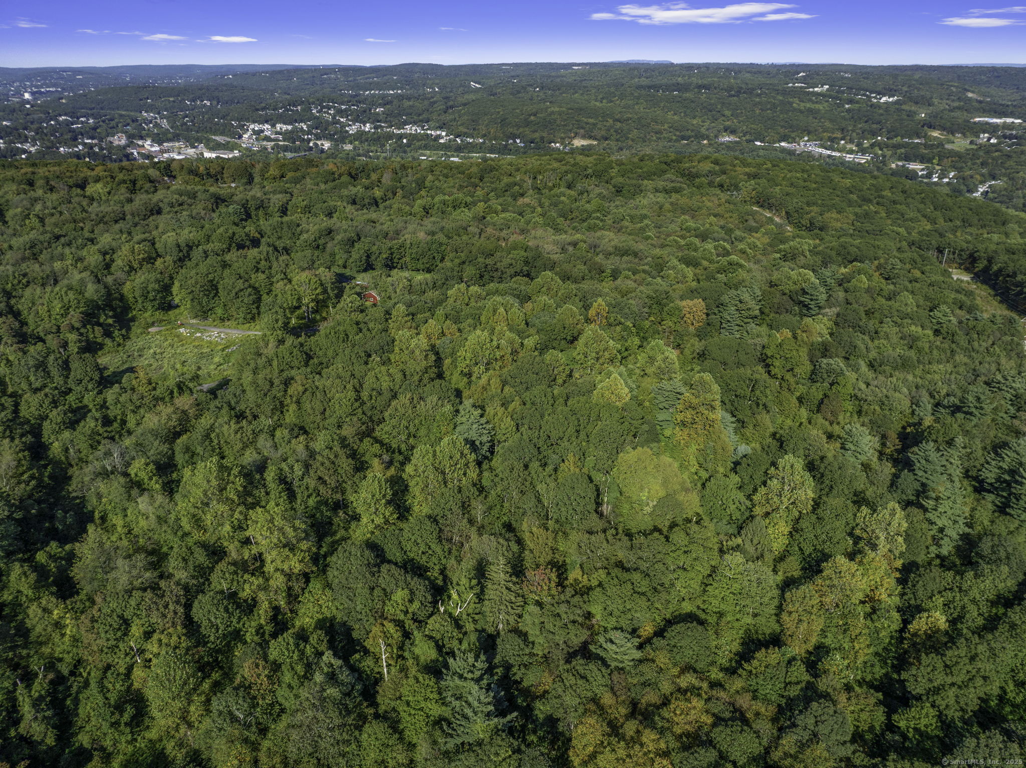 100 Hunters Mountain Road Naugatuck, CT 06770 - Photo 11 of 16 a view of a green field with lots of trees in it
