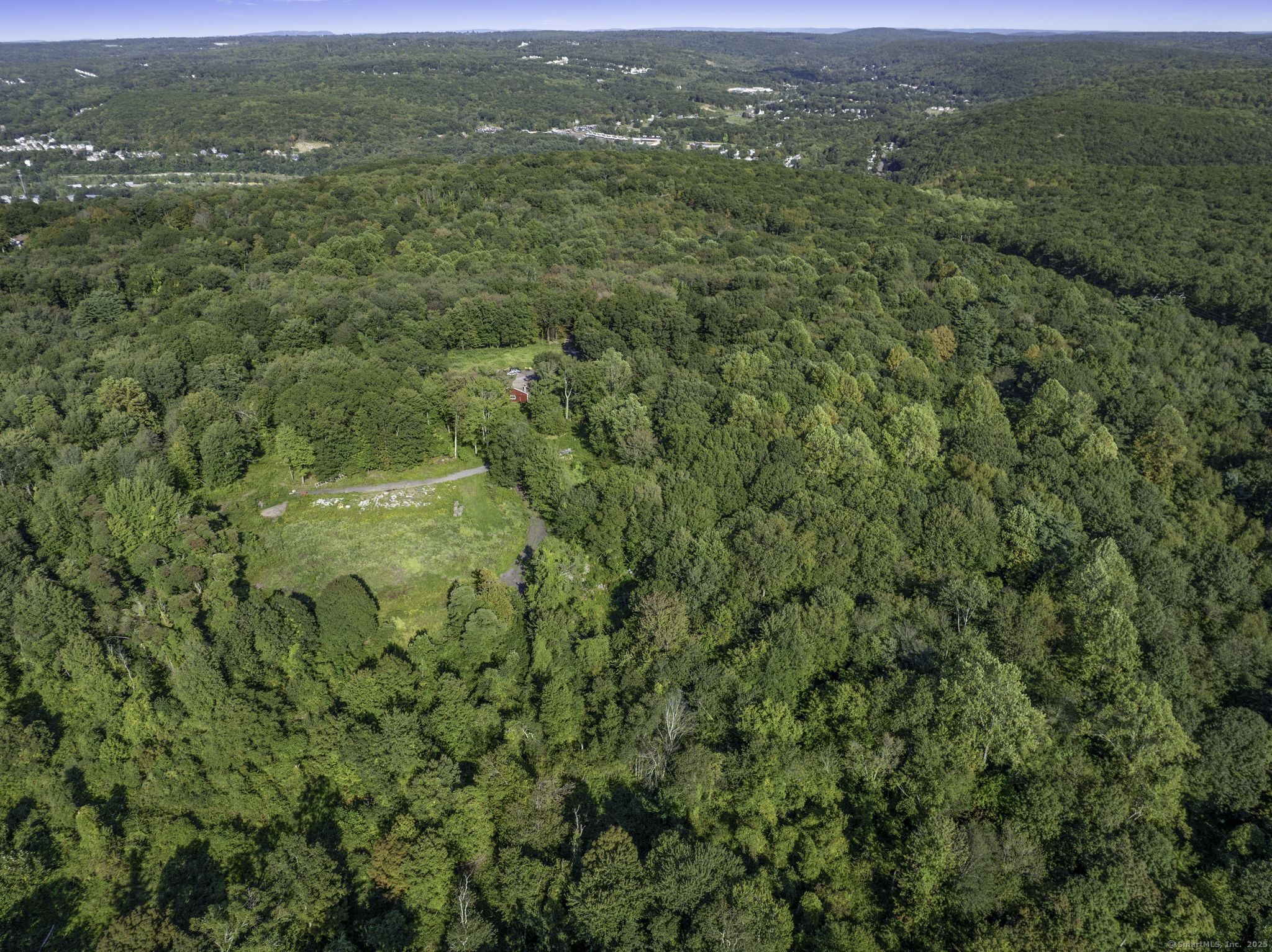 100 Hunters Mountain Road Naugatuck, CT 06770 - Photo 12 of 16 a view of a city with lush green forest