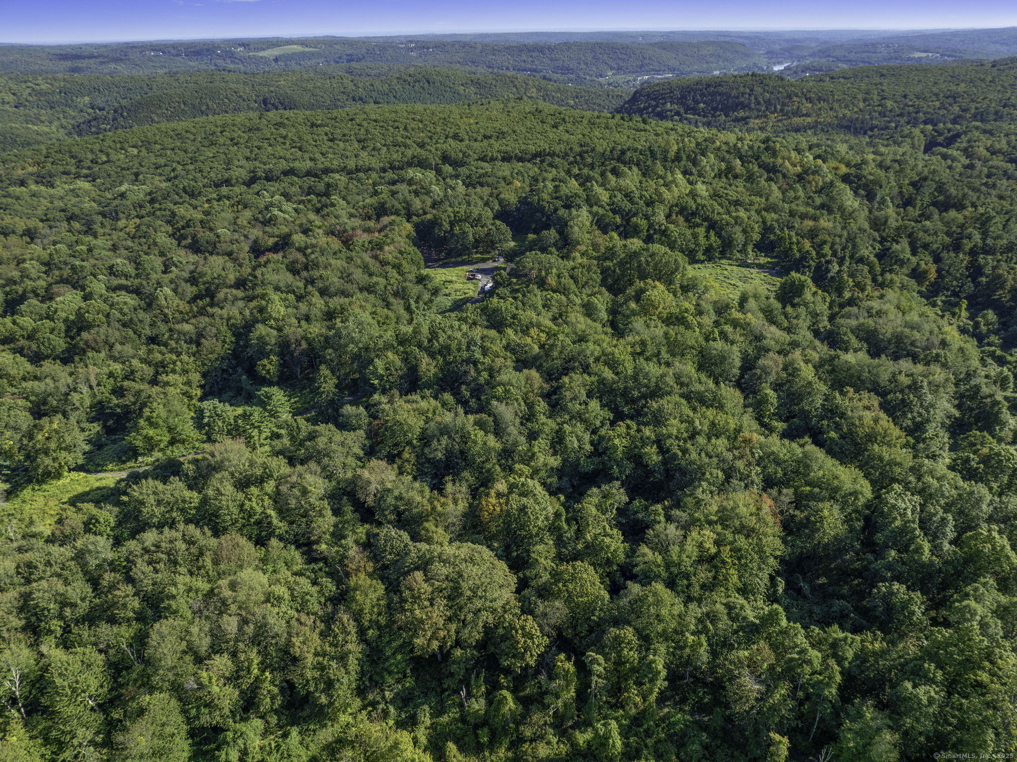 100 Hunters Mountain Road Naugatuck, CT 06770 - Photo 13 of 16 a view of a green field with lots of bushes