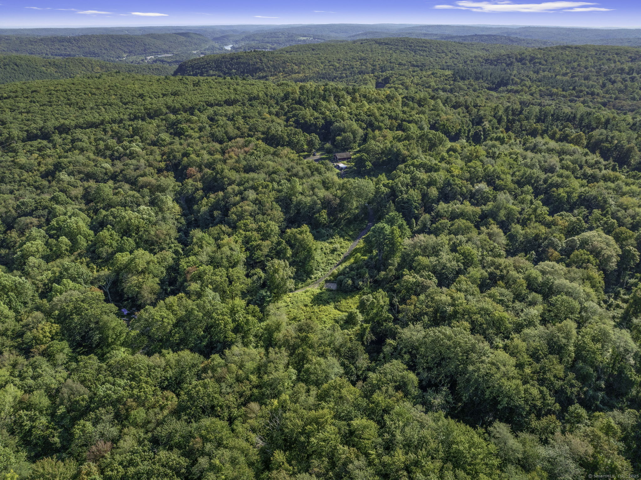 100 Hunters Mountain Road Naugatuck, CT 06770 - Photo 16 of 16 a view of a green field with lots of bushes