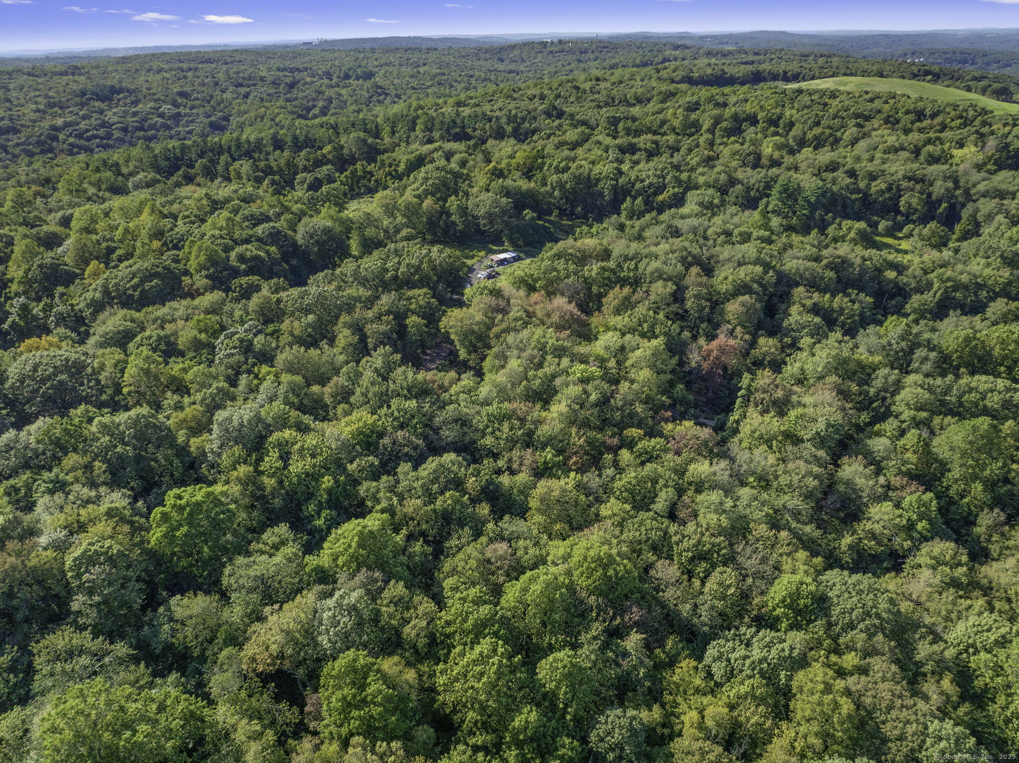 100 Hunters Mountain Road Naugatuck, CT 06770 - Photo 8 of 16 a view of a green field with lots of bushes