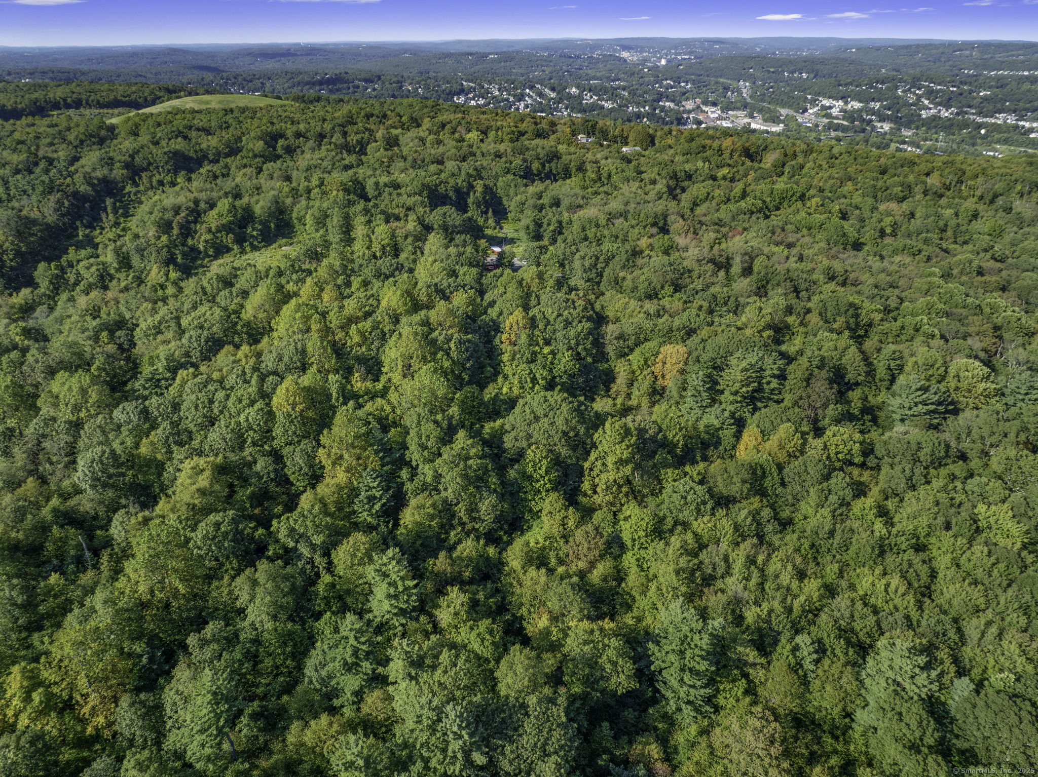 100 Hunters Mountain Road Naugatuck, CT 06770 - Photo 10 of 16 a view of a city with lush green forest