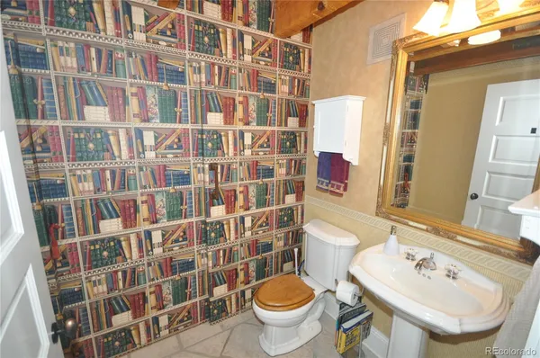 a bathroom with a sink and a toilet