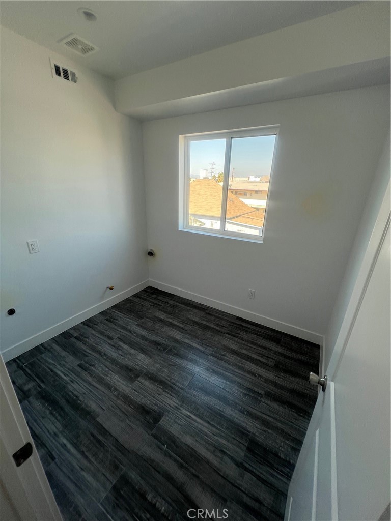 1128 South Ardmore Avenue Los Angeles, CA 90006 - Photo 17 of 30 a view of wooden floor