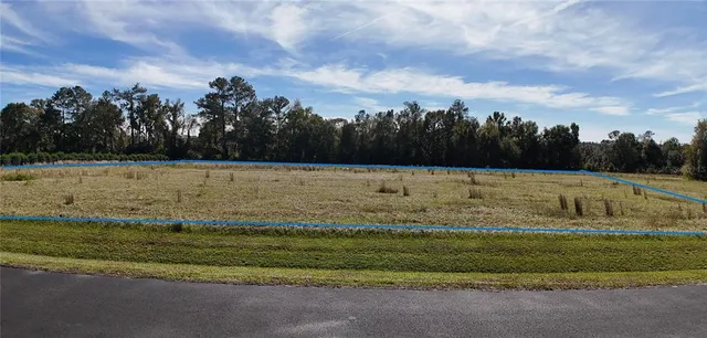 a view of a balcony with two chairs