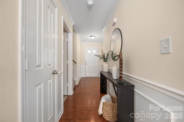 a view of a bathroom with a sink and mirror