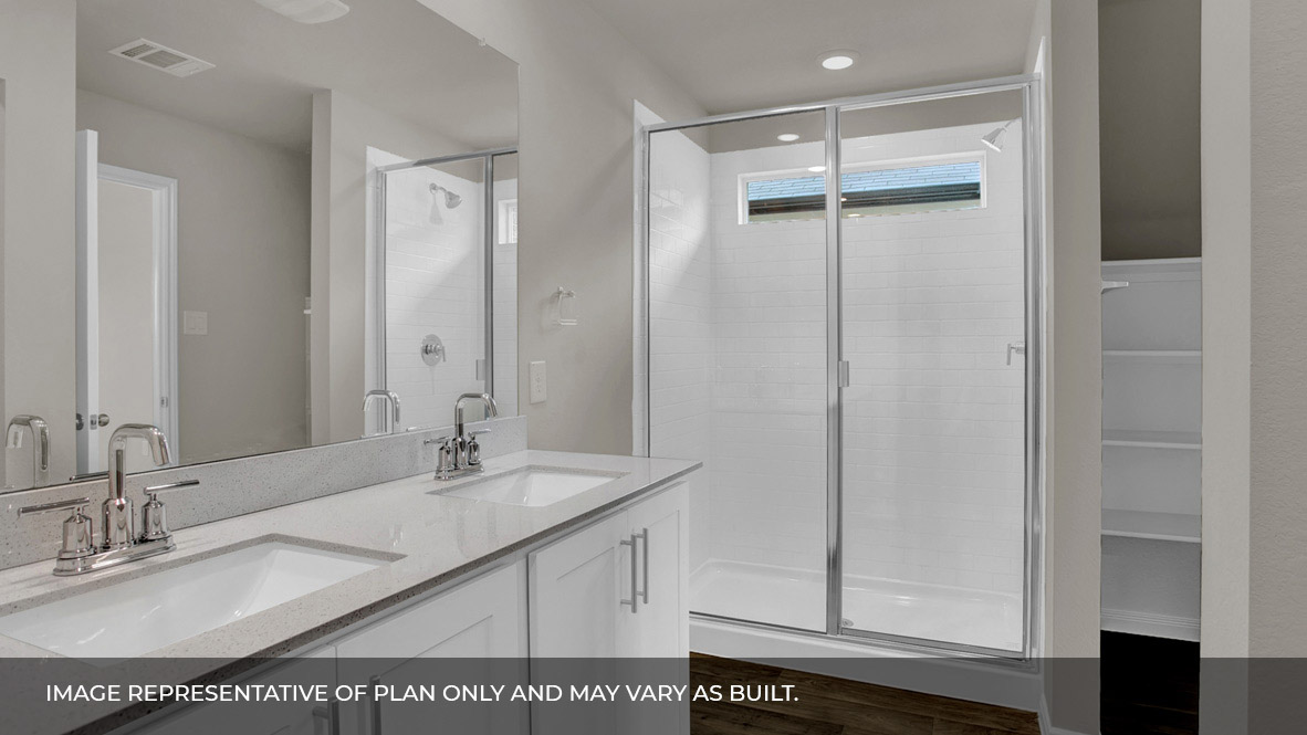 135 Morning Glory Loop Kyle, TX 78640 - Photo 19 of 22 a bathroom with a sink vanity and a mirror