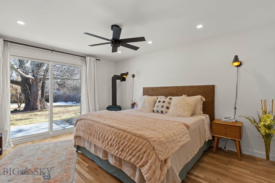 9200 River Road Bozeman, MT 59718 - Photo 25 of 46 Primary bedroom with patio access