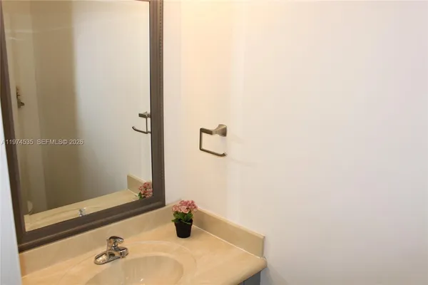 a view of a tree in a yard