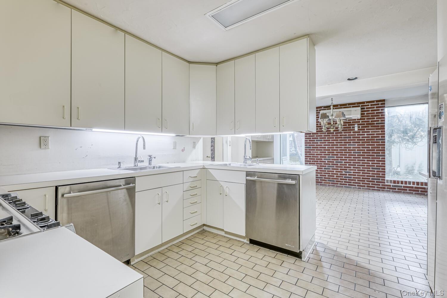 38 Forshay Road Monsey, NY 10952 - Photo 13 of 34 a kitchen with a sink cabinets and window