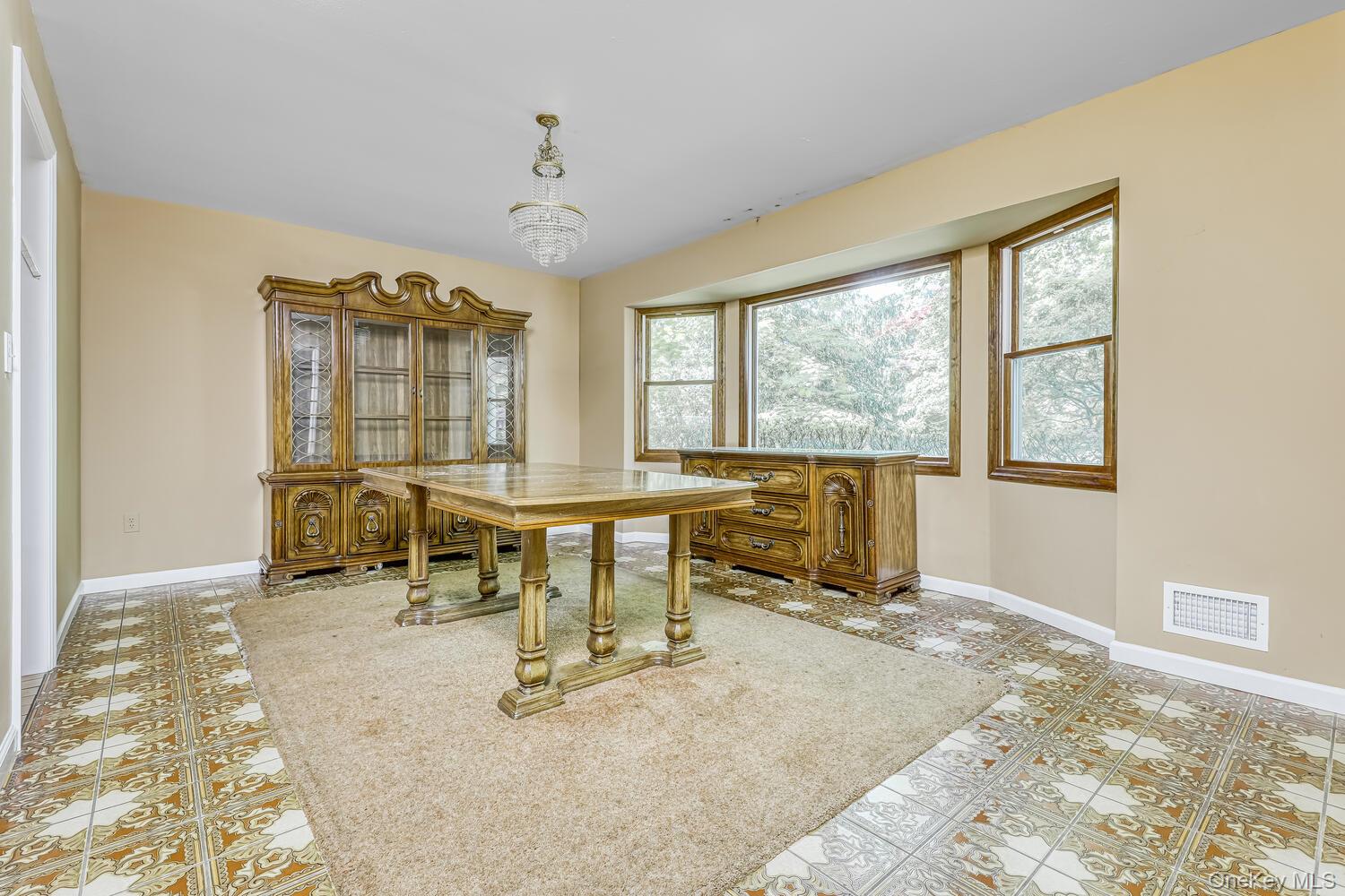 38 Forshay Road Monsey, NY 10952 - Photo 10 of 34 a workspace with chandelier