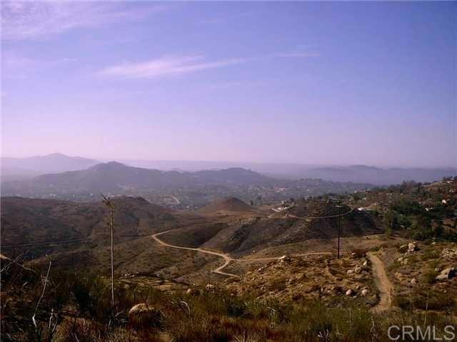 a view of city and mountains