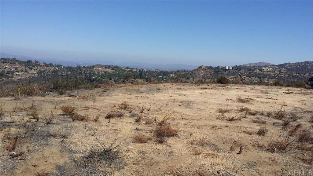 15425 Westview Road Poway, CA 92064 - Photo 18 of 24 a view of a dry yard with mountains in the background