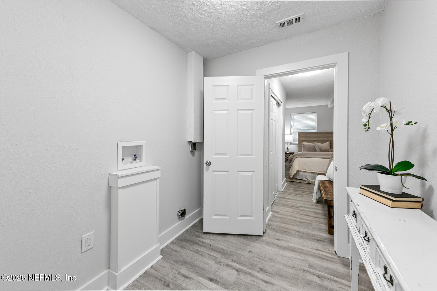 715 Ralph Street Jacksonville, FL 32204 - Photo 13 of 21 a view of a bedroom from the hallway