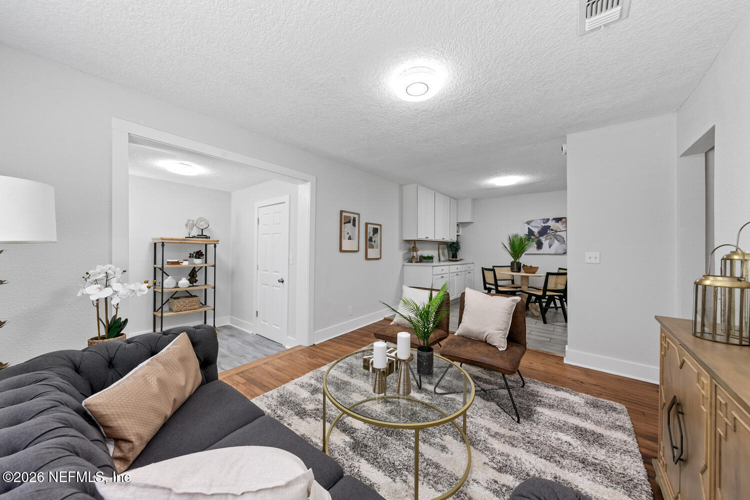 715 Ralph Street Jacksonville, FL 32204 - Photo 4 of 21 a living room with furniture kitchen view and a dining table