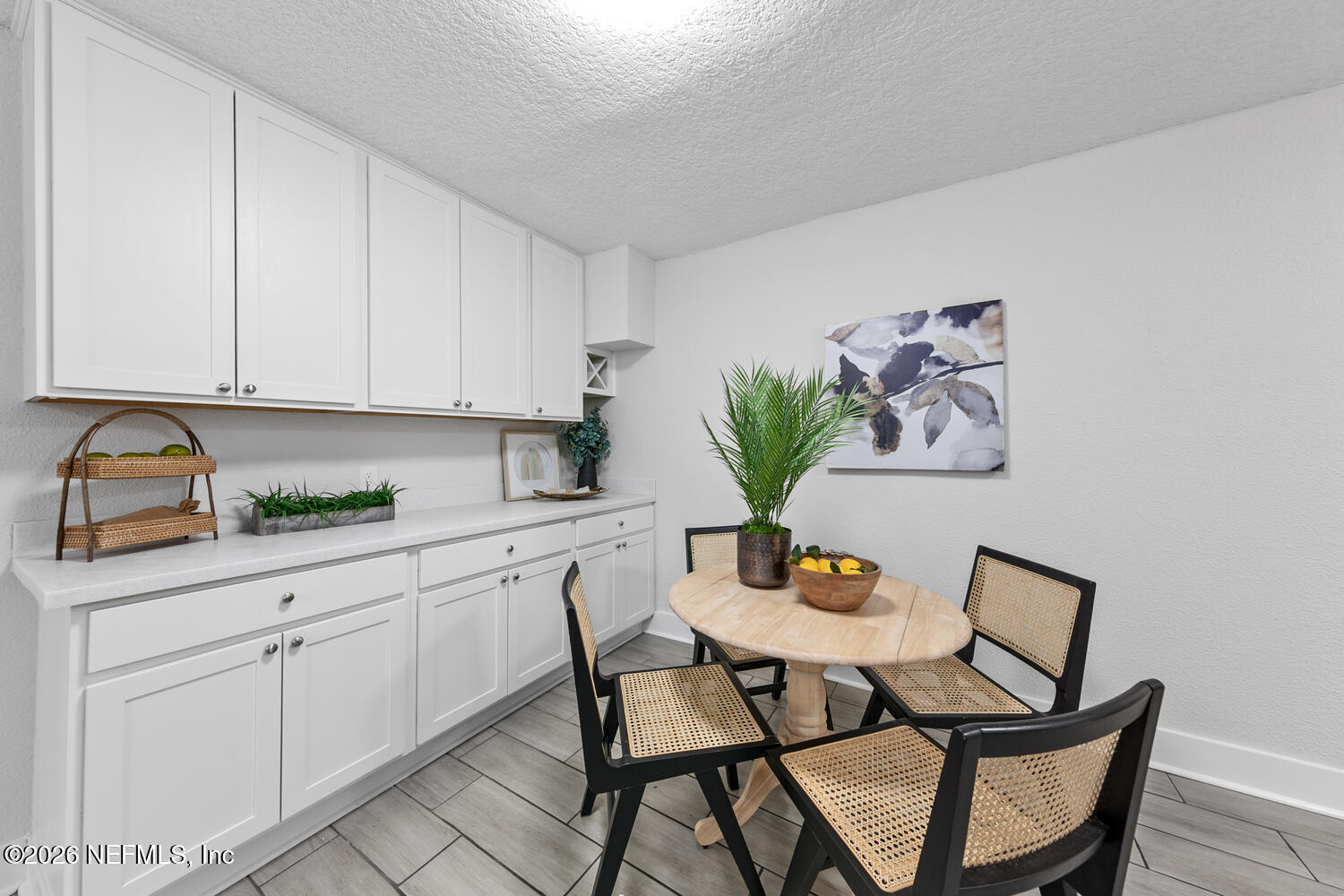 715 Ralph Street Jacksonville, FL 32204 - Photo 6 of 21 a kitchen with stainless steel appliances kitchen island granite countertop a dining table and chairs