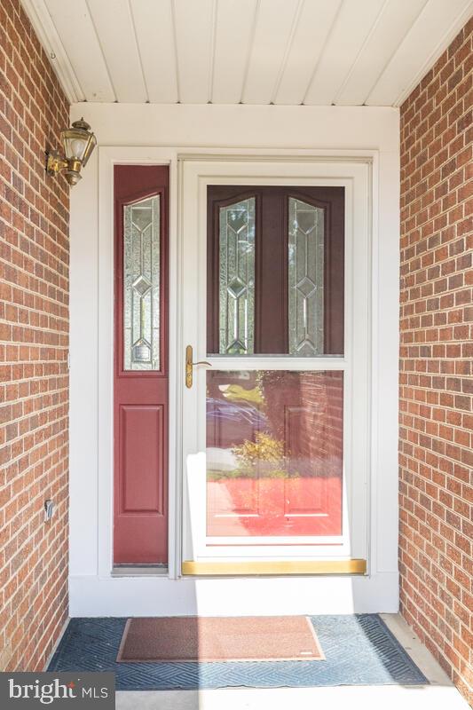 14226 Summit Lane Laurel, MD 20708 - Photo 4 of 58 Front door panes lets in natural lighting